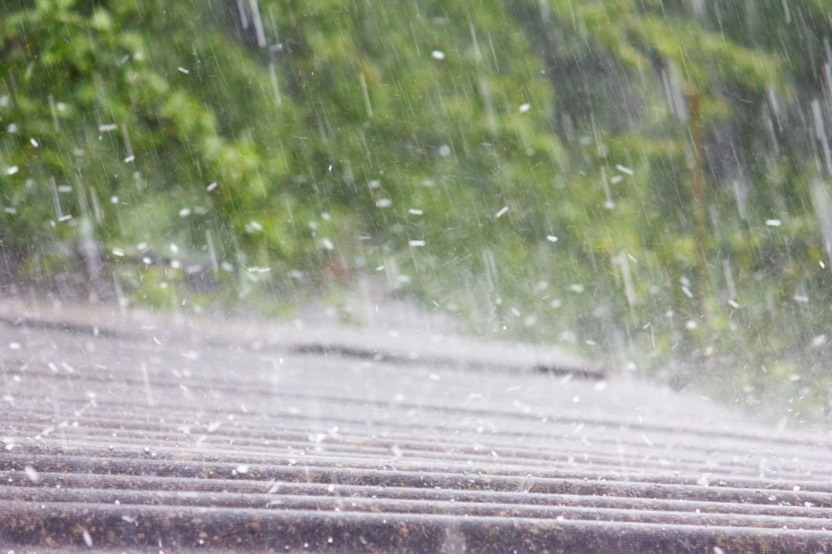 Storm-damaged residential roof inspection